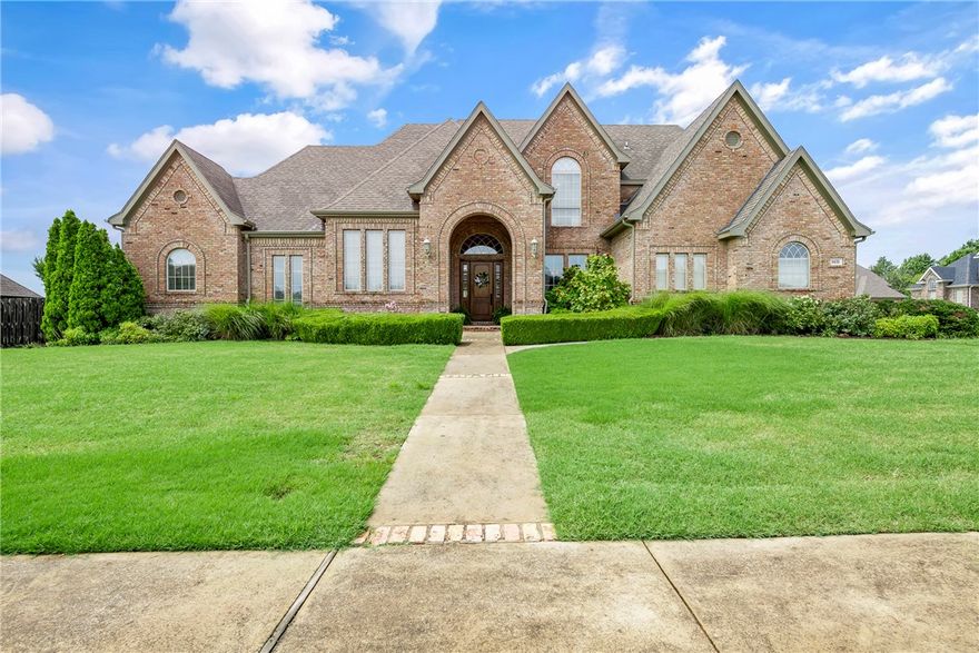 This beautiful well maintained 5 bedroom, full brick home on a oversized .57 acre corner lot gives your family everything they might need! As you enter, you are welcomed by a dramatic double staircase and 20' ceilings and spacious dining room. The chef's kitchen is around the corner with a cozy hearth room that overlooks the porch and backyard. The primary bedroom is tucked away for privacy, but right next door to the the quiet study. The second bedroom on the main floor is great for guest or even a possible in laws quarters. Upstairs the kids have plenty of room for fun and movies. This home has it all, dining room, study, bonus room, media room and even a 4 car garage! For that boat are maybe even a workshop! Come take a look at this stunning home. All ready and waiting for its new owners!