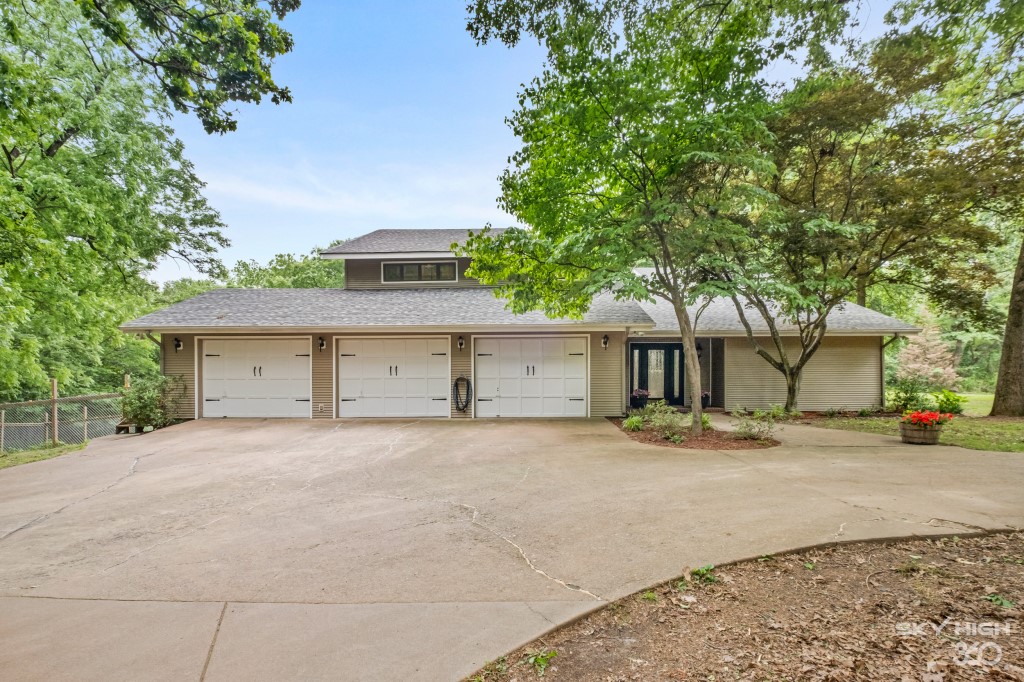 Peaceful, Private Oasis, yet close to everything! Park-like setting with lots of mature trees. 2 Story, 4BR, 3.5BA, 7mol acres. Large Natural Stone wood-burning fireplace. Open concept kitchen/living room. The Study has built-ins with a desk area. Wrap around deck for entertaining family and friends. 3 bedrooms are upstairs. Primary has a full bathroom with walk-in closet and a private deck. The downstairs bedroom has its own separate entrance and full bathroom, but still part of the house. Prayer room/reading nook/loft with access from bedroom by stairs. Large Laundry room. Fenced yard to L of home for pets. Long private driveway. RV Parking w/hookup & Utilities. Outside city limits. New Roof '22. New Gas Stove '22. New Dishwasher '23. New Above range microwave '24. 2 water heaters. The 2 window units we installed are just personal preference & Can be removed. Regular heat/air units work Great! Hot tub/storage building will not convey.