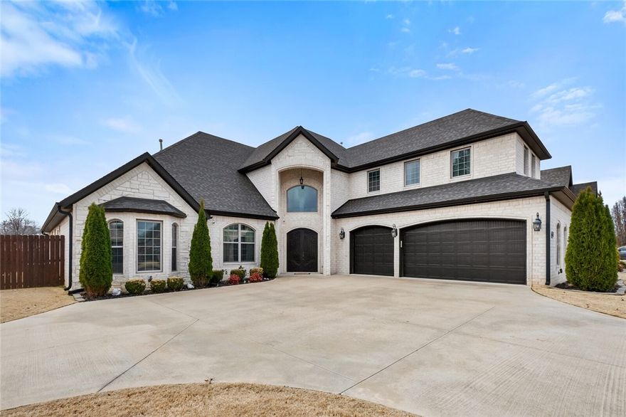 Discover luxury in this stunning 3790 sq ft home in the esteemed College Place subdivision. Featuring 5 bedrooms, 3 full and 2 half baths across 2 levels, it blends modern comfort with elegance. The grand entryway, highlighted by a sparkling chandelier and a custom ceramic-tiled staircase, sets a tone of sophistication. The chef's kitchen boasts a double oven and pot filler, with quartz countertops. You will love the soaring ceilings and custom wooden beams in the living room. The master suite offers a spa-like bathroom and a connected laundry room for ultimate convenience. Upstairs, a large room wired for a projector is ideal as a media or bonus room. Wired for sound, with upgraded light fixtures throughout, and featuring a mix of laminate, wood-grain tile, and ceramic flooring, every detail caters to a lavish lifestyle. Outdoors, enjoy an extended concrete patio, gas grill hook up, and a soothing hot tub. A masterpiece of design and craftsmanship awaits, just minutes from I-49.