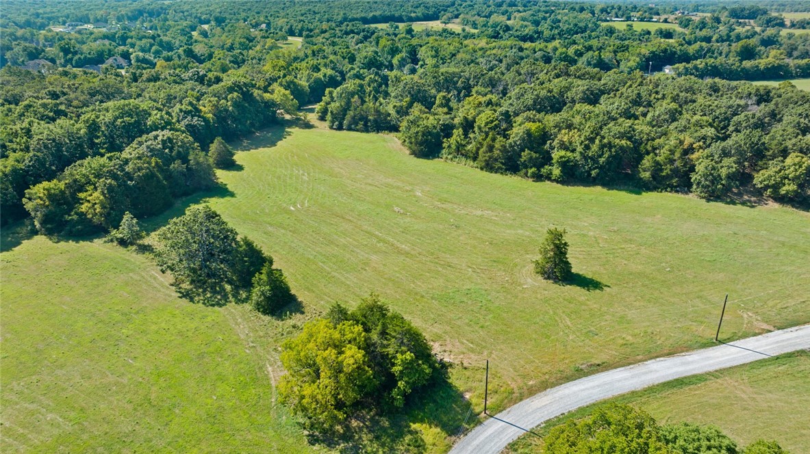 Located in Goshen Arkansas and in the Fayetteville School District you will find a rare opportunity to build your custom home on a private five acre lot located in the prestigious Cedar Ranch Estates. Designed to preserve the natural beauty and privacy appreciated in the Goshen area, and with opportunity to design the perfect dream estate. Each lot is uniquely different ranging from beautiful valley views, to stream side oasis, to pond side elegance, to rolling grassy fields. With each lot you will have the opportunity to create a home on an estate sized lot with the unique features desired by everyone. Come visit Cedar Ranch Estates and make it your last home.