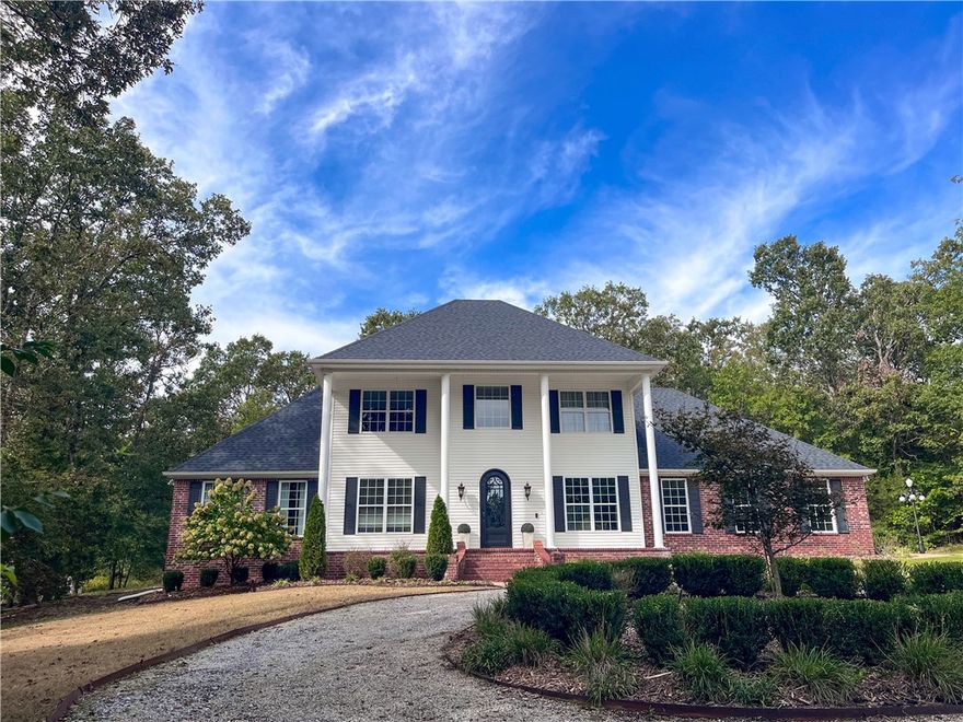 Welcome to your dream home! Nestled on 2.83 wooded acres just minutes from Vandergriff/McNair, this beautifully updated 3,300 sq. ft. property offers privacy, space, and exceptional outdoor living. Step inside to an open floor plan with a chef’s kitchen featuring a massive island, stainless steel appliances, and updated flooring, paint, and countertops. The main floor includes a spacious primary suite with a spa-like bath (jacuzzi tub, walk in shower, dual closets), a dedicated office, formal dining room, and laundry. Upstairs you’ll find three bedrooms, two full baths, a bonus/theater room with projector, family room, and a flexible gym/extra room with a large temperature-controlled storage closet—ideal for hobbies or an additional bedroom. The outdoor spaces are a true highlight: a heated pool, covered patio with outdoor fireplace, built-in grill and cook area, oversized fire pit, and fenced backyard surrounded by nature and wildlife. This home has it all!!