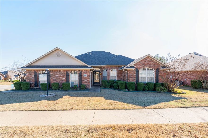 Stunning Northridge 4-bedroom, 2-bath home loaded with extras. The kitchen was completely remodeled in 2020 with beautiful quartz countertops, a marble herringbone backsplash, pantry, under-cabinet LED lighting, stainless steel appliances, and a breakfast bar & seller is leaving barstools. Fresh paint and updated lighting throughout. The spacious living room features real wood floors and a gas log fireplace. Split floor plan with a large master bedroom. The master bath boasts a walk-in shower, double sinks, whirlpool tub, and walk-in closet. Sellers are offering a $5k carpet allowance for the bedrooms. A bonus room off the covered back patio is heated and cooled, perfect for an office, storage, or workout space. New storm doors on the front and back, plus a new insulated garage door. Situated on a corner lot with vinyl fencing and landscaping lights for added security.