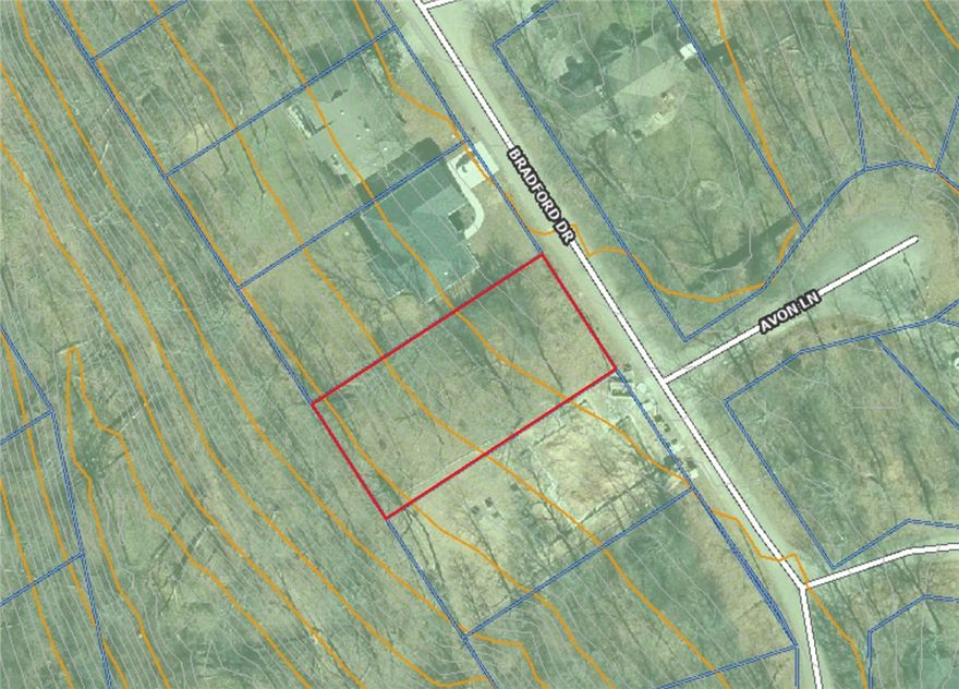 Check out this cookie cutter Buildable lot with a moderate slope, between two newly built homes.  This lot has already had a perc test and would be suitable for at least a 2-Bedroom Home.
