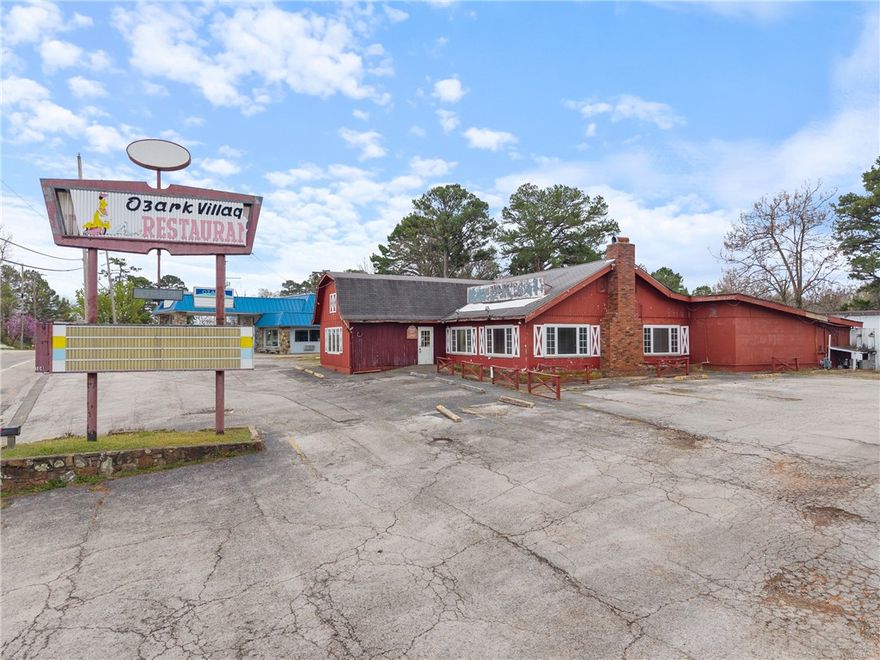 High traffic commercial property for sale in Eureka Springs! Unlock the potential of this premium commercial real estate opportunity in the heart of Eureka Springs! Situated at the busiest intersection in town, Huntsville Rd and E Van Buren, this +/- 7.5 acre property boasts an average traffic count of 7,350 VPD, offering exceptional visibility and exposure for your business. The site includes a +/- 6,987 SF commercial restaurant building, ready for renovation or a complete rebuild, depending on your vision. Whether you're looking to revamp the existing structure or start fresh with new construction, this location provides unmatched potential. Additional features include, a large on-site parking lot for customers and employees, three extra adjoining lots offering further development opportunities, and located in a high-demand commercial corridor! Ideal for retail, dining, service industry, or mixed-use development - this Eureka Springs commercial property is a rare find in a high-traffic, high visibility location.