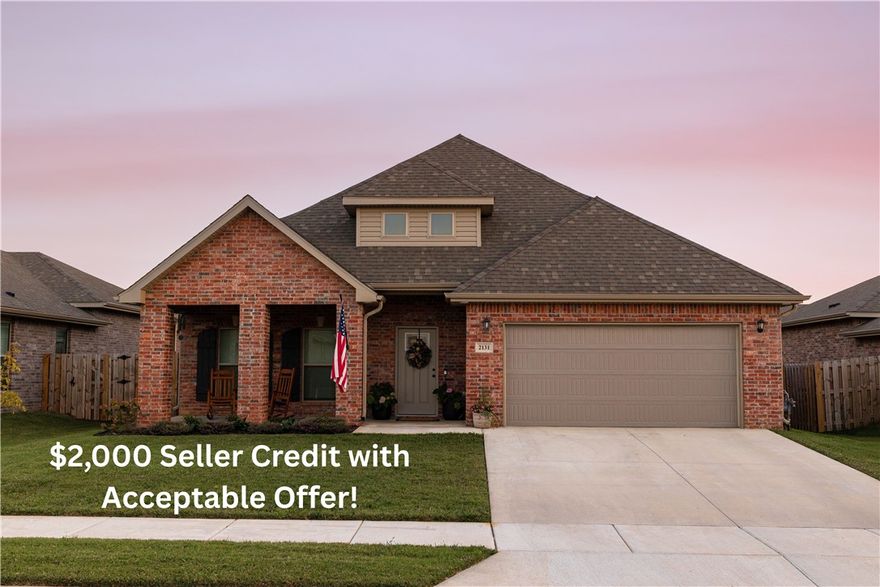 $2,000 Seller Credit w/ Acceptable Offer! Welcome home to your beautifully finished and thoughtfully designed floorplan with space for the whole family to spread out. The open and airy first floor features a large living room beaming with natural light and an elegant electric fireplace. The spacious kitchen has stylish black stainless steel appliances and an oversized walk-in pantry for all of your storage needs. The primary bedroom is located on the first floor with an ensuite bath with double vanities, a large soaking tub and walk-in shower. The oversized primary closet flows effortlessly into the laundry room for ultimate accessibility & convenience. The 2nd floor has 2 additional bedrooms, a full bathroom and a flex space ideal for a play area, side hustle or office needs. The fully fenced backyard boasts a covered patio with a 10'x20' extension. Garage is wired for 240V EV chargers. Located less than 10 miles from downtown Bentonville, XNA airport and Walmart HQ. Priced to sell and ready for its next owner!