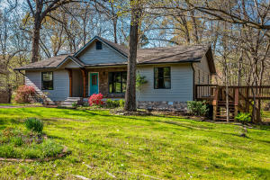Creatively updated! The home should be on a television episode of HGTV. Move in ready! Large pantry, new appliances, subway tile back splash, and stained concrete counter tops highlight the beauty of the open kitchen. LVT flooring throughout, ship lap and custom woodwork in the most popular style. Modern farmhouse feel on the inside , modern craftsman outside. Each bedroom has a direct bath access to make each one feel as its own master suite. The large lot is tree shaded and beautifully landscaped. The circle drive allows your guests to arrive in style!