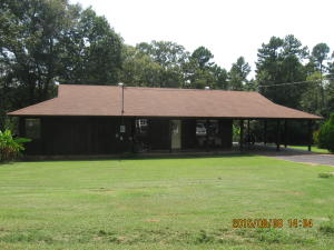 Cute cute cute! 3 bd/1 ba cedar home sitting on 3 acres! This home includes wood floors and stainless steel appliances. If you want seclusion, this is it! Call today!