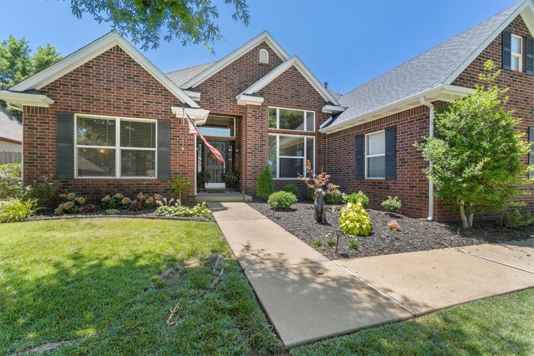 This beautiful home located 5 minutes from shopping, concerts and amazing nights on the town in Rogers boasts a bright open floor plan with 3 bedrooms and an office. All of the extras are too many to tell including a wine fridge/rack whole home surround sound, corner lot and a big beautifully landscaped backyard with a covered patio ready to entertain friends and family (and enough room to add that pool you've always wanted)! The large primary suite has room big enough for your sitting area to curl up and read a book. The attic is fully floored for all your storage needs. Call me for your personally showing!