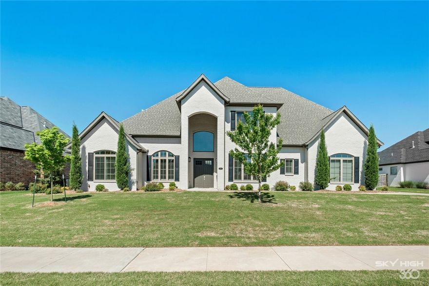 The HOME that has it ALL! LIKE BRAND NEW! 5 bedrooms with walk in closets, office, formal dining, oversized breakfast area, bonus room with wet bar AND a home theater room! The storage will amaze you! So many closets, a finished and an unfinished attic storage. Laundry room with expansive counter space, sink, an abundance of cabinets and laundry sorting drawers. The lay out is perfect for everyone having their own private space but also having an amazing gathering area for all. Gorgeous wood floors, 8' doors, wood beams in the office and living room, crown molding throughout, plantation shutters, exceptional trim work, a chef's kitchen with a 6 burner gas cooktop with griddle, double ovens, pot filler, apron sink.  To the ceiling custom cabinets with Adjustable shelving. Walk in pantry, locker/drop zone, central vac with kickplates. 4 car oversized garage with insulated garage doors. Did I mention the HUGE lawn beyond the covered patio with electric screen?!  Showings begin Thursday! Reviewing through Monday.