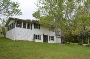 This 3 bedroom 2 bath home has recently undergone a lot of renovation. Brand new carpet. New paint. Some new fixtures in the bathrooms. It still needs a few minor things but is certainly move in ready. Enjoy a sunroom. Space for a small office or kids study. There is a 30 by 40 workshop with concrete slab floor plus other outbuildings. Perfect playground for a 4-wheeler or place to keep a horse.