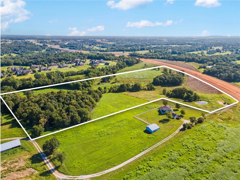 This is the dream property you’ve been searching for! Sweeping views that will take your breath away, paired with an unbeatable location, make this 11 ± acre tract a rare find. Perfect for a private luxury estate, high-value residential development, or even a future commercial venture, this land offers exceptional investment potential just south of Churchill Downs and minutes from the heart of growing Tontitown and all Northwest Arkansas amenities.
Currently zoned R3, the property’s proximity to the new bypass not only provides outstanding accessibility but also positions it as a prime candidate for potential commercial rezoning. Whether you envision an unforgettable estate, a sought-after subdivision, or a strategic commercial site, the possibilities are endless. Enjoy the peace of country living while staying just moments away from shopping, dining, schools, and major transportation routes. Do not miss this amazing opportunity for land minutes away from everything Northwest Arkansas has to offer!