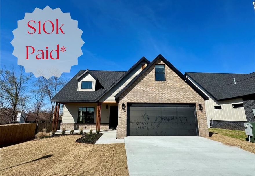 $10K PAID! $6500 in builder credits & $3500 preferred lender credits!  Fabulous new construction near the Promenade and Rogers Aquatic Center!
These elevated homes showcase stunning design with white oak flooring, high-end countertops, and designer tile selections throughout. Vaulted ceilings and floor-to-ceiling cabinetry create a grand, open feel, while the butler’s pantry, with counters and outlets, keeps your gorgeous kitchen clutter-free.
The primary suite is a true retreat, featuring a spa-like bath with a frameless glass shower wrapped in floor-to-ceiling tile, a garden tub, and dual vanities. The spacious walk-in closet offers custom shelving, drawers, and hanging space for ultimate organization. Upstairs, you’ll find three additional bedrooms and a full bath with the same elevated finishes, plus one room easily doubles as a bonus living area.
Outside, enjoy full sod, front landscaping, and a private backyard with a gate and wood privacy fence!