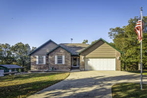 Immaculate 4 BR, 3 Bath home in Omaha's Stonegate Subdivision--- complete with a full finished basement and second kitchen that could be used as a mother-in-law suite or for entertaining. Glassed sunporch gives you extra outdoor space to relax. This well-maintained home features a wood fireplace that's never been used, as well as a wood stove in the basement. There are two additional outbuildings--a workshop and an additional detached garage. New roof in 2017, new HVAC in 2018.