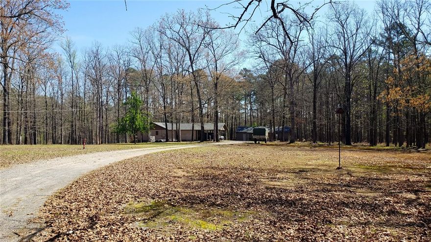 Hunters Paradise!! Beautiful 3 bedroom, 2 full bath home sitting on 5.45 acres m/l. This home has national forest on two sides. There is a huge shop that most men only dream of. The shop has a heated and cool room attached that would make a great guest room or man cave. New roof and HVAC that is less than a year old. Brand new gorgeous deck finished in 2026 perfect for watching the deer play in your back yard. There is an emergency propane heater ready to use on those cold winter days. Two capped wells on the property. There are also 2 apple trees and 1 pear tree on the property.