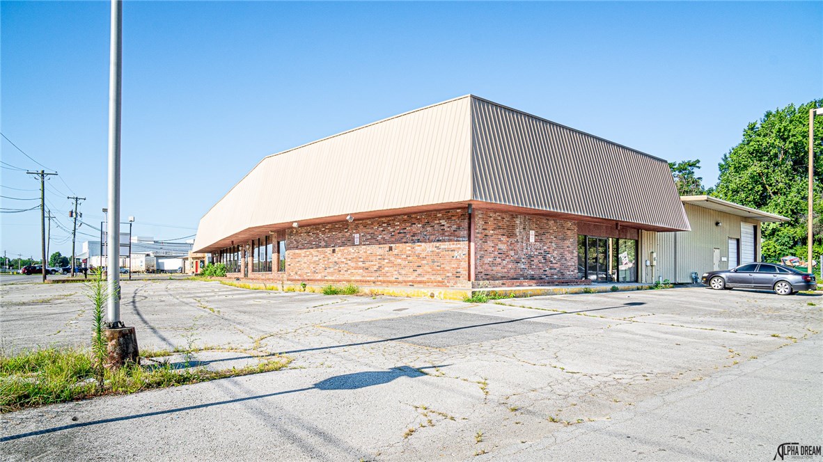 Prime location and tons of potential, close to Springdale Revitalization area, Just over 15,000 square feet, retail with 10 offices, bathrooms, kitchen and huge warehouse, 3 overhead doors, loading dock, back side is fenced and has potential for additional parking space. Zoned Commercial C2