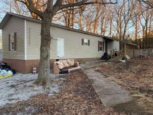 Three bedroom one bathroom mobile home on 1.75 ac m/l. Mobile needs some work but would make a great property!