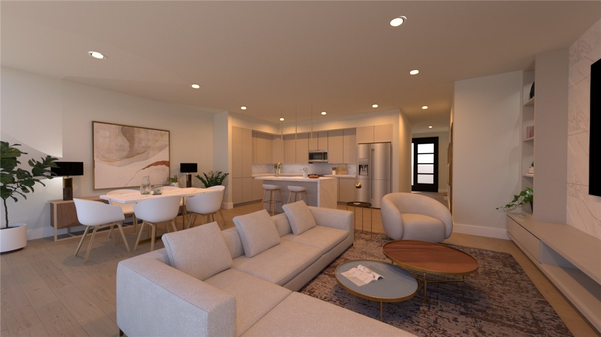 The townhomes at Parkside of Lowell showcase a modern aesthetic with thoughtfully designed open floor plans. Every unit features premium finishes, including quartz countertops, stainless steel appliances, and upscale luxury vinyl oak flooring. All-electric systems ensure energy-efficient heating and cooling for comfort and cost savings. Parkside combines contemporary design with an active lifestyle, with no restrictions on short-term rentals, making it a prime investment opportunity. Residents enjoy amenities like a clubhouse, gym, pool, and direct access to the Razorback Greenway for endless outdoor adventures. The community is centered around Kathleen Johnson Park, soon home to the NWA Space and Science Center, a soon to be major destination in NWA. The new flex space adds value with a mix of restaurants, businesses, and storage solutions for residents. As Lowell continues to grow in the NWA region, Parkside remains a standout community.