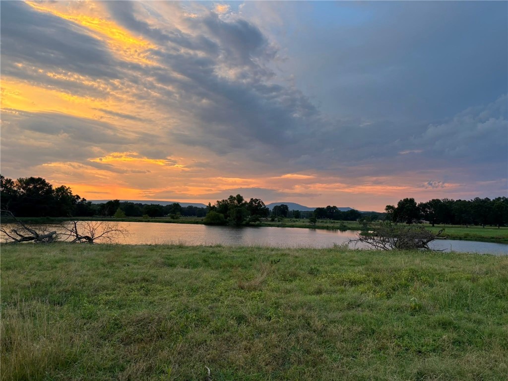 Escape to your own private retreat with this charming 3-bedroom, 2-bath farmhouse, set on 190 sprawling acres of pasture, woods, and rolling countryside. This property is ideal for anyone seeking tranquility, space, and rural living in style.well-stocked pond, perfect for fishing, wildlife, or serene water views.
