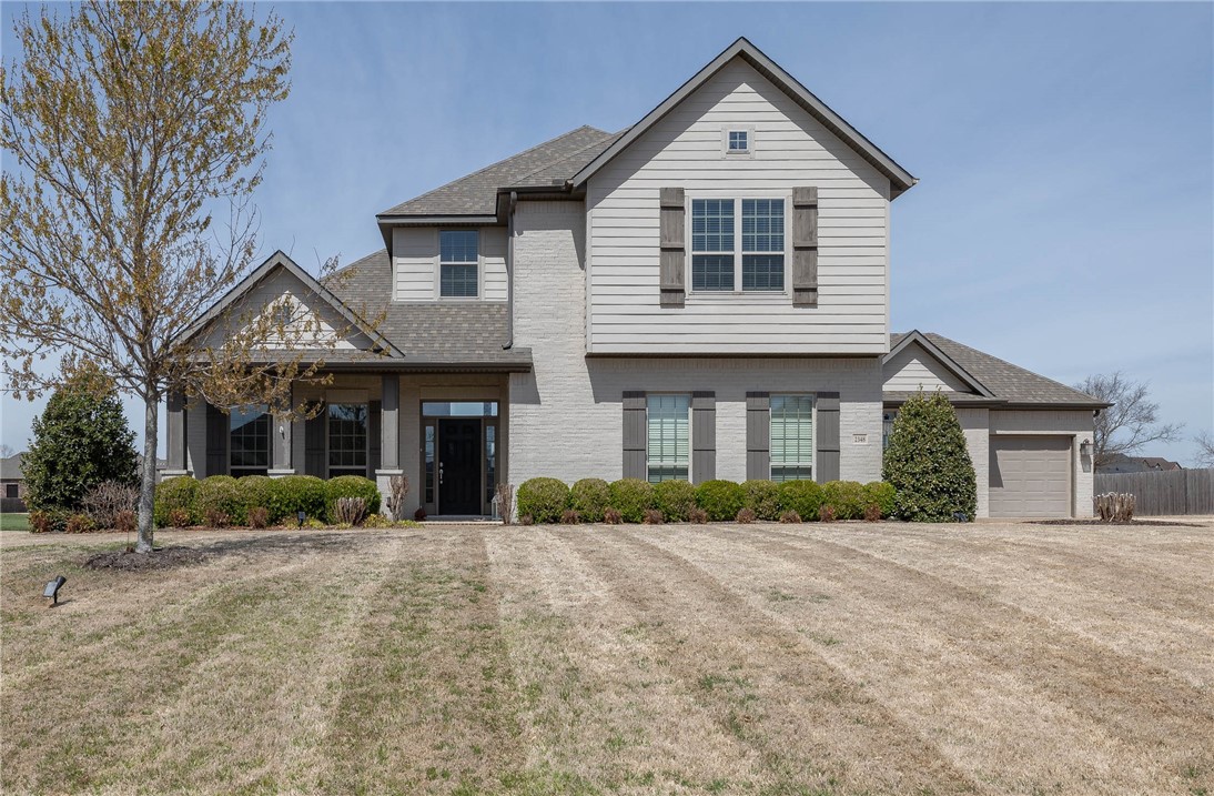 Beautiful home in East Fayettevilleās Waterford Estates! 3,048 heated sq ft includes 4 bedrooms, 3 full & 1 half bathrooms, open eat in kitchen to living room, formal dining, laundry room and a loft bonus area. Other amenities include gorgeous hardwood floors, amazing kitchen with a coffee bar, stainless steel appliances, double ovens, gas cooktop, walk in pantry, fireplace in the living room with gas logs, built ins, 3 car garage, and a covered patio with outdoor fireplace. This property is in a premier gated community that offers a community pool, fishing ponds, and river access to the White River! Zoned for Vandergriff Elementary School.