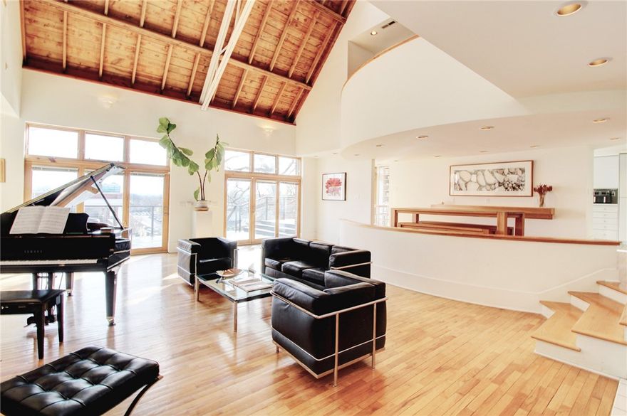 Meticulously maintained, this architecturally significant residence blends history with modern luxury. Originally built in 1936 as a church and thoughtfully repurposed into a home in the 1990s, it showcases cathedral ceilings, exposed steel and wood structural elements, and abundant natural light throughout. The bright, modern kitchen features high-end appliances and generous space for entertaining throughout the living spaces both inside and outside. Four and a half of the five and a half bathrooms have been professionally redesigned with hand-laid ceramic tile, European luxury fixtures, Toto toilets, and handcrafted wood cabinetry. A rare opportunity to own a distinctive property just moments from Dickson Street, the University of Arkansas, the Fayetteville Square, the Public Library, and easy access to the Razorback Greenway trail system.