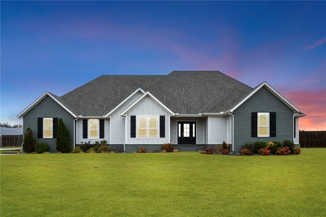 Looking for a home with land? Here it is! Situated on a beautiful, flat 2 acre parcel, this 2019 build is sure to check all of your boxes! Inside you'll find a lovely open floor plan in the common areas, featuring vaulted ceilings, windows that allow plenty of natural light, a large kitchen island with bar seating and a spacious eat-in kitchen perfect for a full size dining table. Off the kitchen you'll find the master suite complete with jacuzzi tub, his/her sinks with a vanity, walk-in shower and a large closet which seamlessly leads into the laundry room. The split layout offers guests privacy along with the ability to use one bedroom as an office if desired. Spend time outdoors entertaining under the large covered patio complete with a built-in grill OR spend your days utilizing the large fenced-in backyard - perfect for children, pets or the gardener in your life. Schedule your showing today!