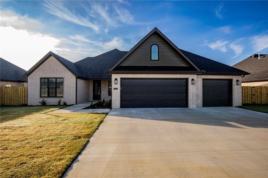 What else would. you want?? This single-story home invites you in with an open floor plan, vaulted ceilings, large living area with electric fireplace in the living room. Another room just off living room that  could be used as a 5th bedroom/flex or office space plus four other spacious bedrooms, three full bathrooms, and generous utility room, laundry, pantry, walk in closets, and a three-car garage. Designer-chosen finishes and details; paint colors, countertops, tile, engineered wood flooring, accent walls, and under counter lighting. It comes with fence, gutters and blinds. The community has a nice pavilion, pool and playground. Preferred lender offering $5000.00 to be used for either rate buy-down or closing costs.  Situated minutes from I-49, Golf Courses, Winery, Arvest Ballpark, Arkansas Children's Hospital and good restaurants! Lender credits offered with preferred lender.