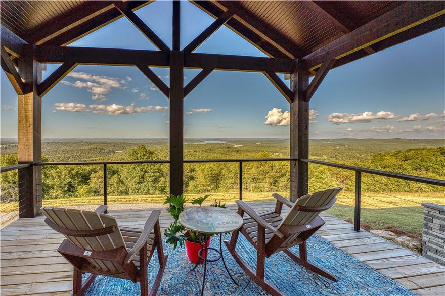 Free million-dollar view with this stunning 2-bedroom, 2-bathroom home (more bdrms can be added) set on 66 acres near Bull Shoals Lake, offering breathtaking views of the Ozarks. This custom-built residence features 10ā ceilings and an abundance of Anderson windows, flooding the space with natural light while showcasing the picturesque landscape. The luxurious bathrooms are equipped with tiled showers and elegant porcelain tile floors, ensuring a sophisticated living experience. Enjoy outdoor dining on the covered deck, where you can savor meals while taking in the serene beauty of your private surroundings of unparalleled tranquility and watch the abundance of deer and turkey roaming the property. This property offers a unique opportunity with a $5,000 flooring allowance, allowing you to select your preferred basement flooring to suit your personal style and preferences.