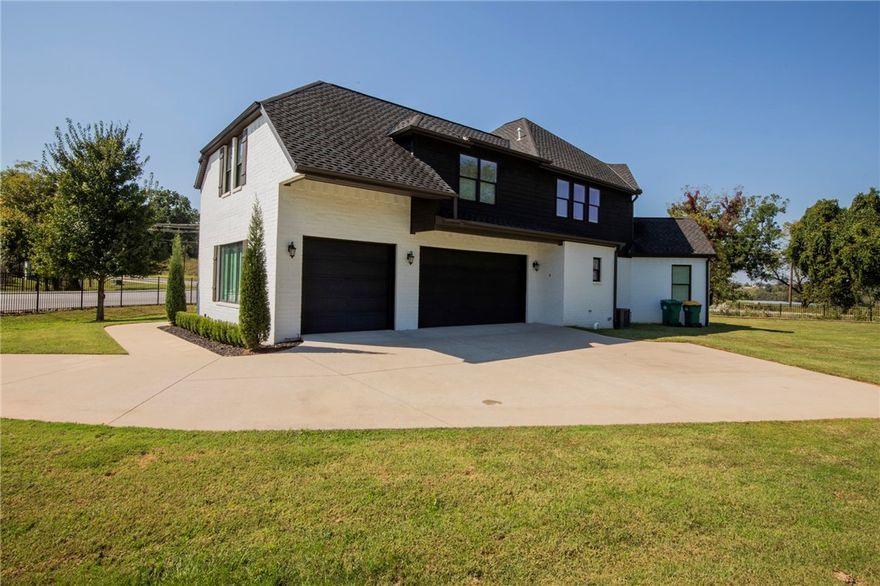 This stunning home in Pinnacle offers a modern open floor plan and chef-designed gourmet kitchen by a famous local chef, featuring a professional Frigidaire built-in refrigerator/freezer and a DCS by Fisher & Paykel professional range and hood. With 4 bedrooms plus a bonus room that can serve as a 5th, there’s flexibility for every need. The main level includes 2 bedrooms, office, dining, spacious laundry, and 2 fireplaces. The master suite boasts heated tile shower floors for ultimate comfort. Hardwood floors flow throughout the main level, staircase, and upstairs hallway. Upstairs you’ll find 2 bedrooms, a bonus/5th bedroom, and abundant storage. Entertain outdoors with a covered deck and fireplace. Convenient rear gate access and a prime location in the Bentonville School District make this home exceptional.