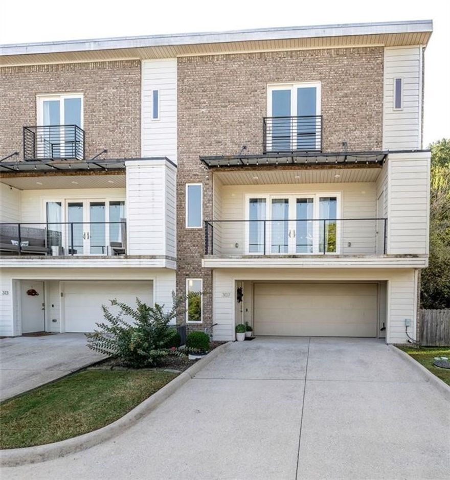 Contemporary executive townhouse with a million-dollar view! This beautifully appointed 3-bedroom, 2.5-bath home offers modern comfort and convenience, featuring a covered balcony, a spacious two-car garage, and smart security features you can access from anywhere. Inside, hardwood floors, granite countertops, a double pantry, and stainless steel appliances create a stylish and functional kitchen and living space. Enjoy the fresh feel of brand-new paint, new carpet, and the three storage closets with more than enough space for activity equipment- to bike, for game day, and more! The yard and exterior are fully maintained by the POA, offering low-maintenance living with a view you truly have to see to believe. Don’t miss your chance to own a slice of NWA living—call today!