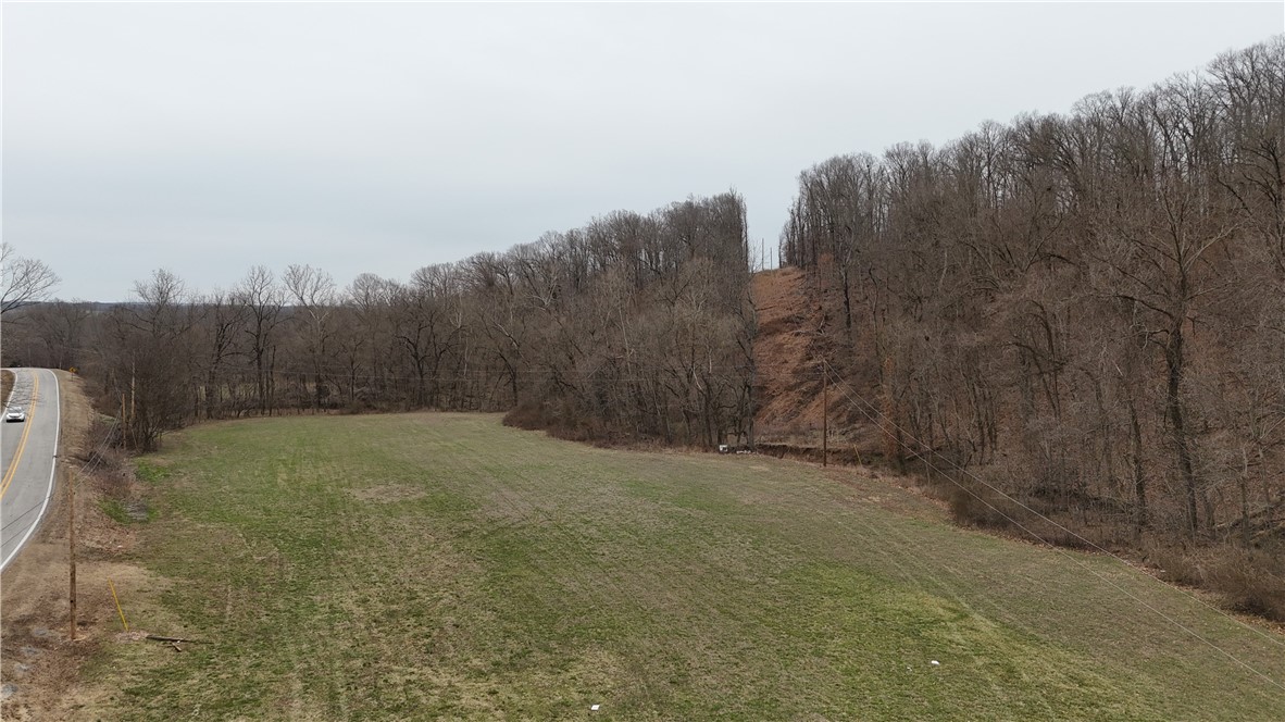 This expansive 15.04-acre property located along Highway 16 in Siloam Springs, AR, presents a unique opportunity to enjoy a serene country lifestyle with close proximity to all the conveniences of downtown. The land offers the perfect balance of privacy and accessibility, just minutes from shopping, dining, and local amenities. With level road frontage ideal for your dream home, as well as expansive wooded areas perfect for outdoor activities like hunting, ATV riding, and hiking, this property is a nature loverās paradise. A seasonal creek runs through the land, adding to its natural beauty and providing a picturesque backdrop. Whether you envision building a private estate, starting a hobby farm, or simply seeking a peaceful retreat, this property offers endless possibilities. The land is ideal for those looking to enjoy the quiet of nature while still being close to the heart of the city. Donāt miss your chance to own a truly exceptional piece of land. Schedule a tour today to see all it has to offer!