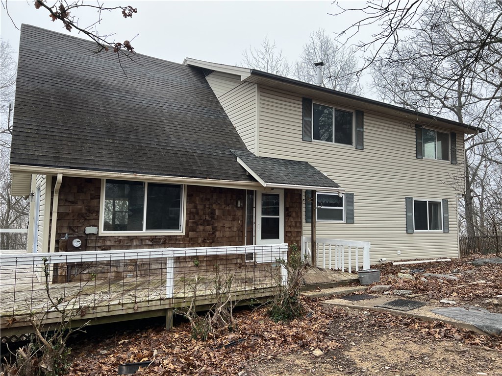 Come check out this 5 BR, 3 BA, with over 2,500 sqft on 20.04 acres m/l. The home features cathedral ceilings, granite kitchen counters, great storage, and so much more with lots of updates. The land has about 7 acres in pasture with a spot for a second home with rural water, electric, and septic. This is a must see.