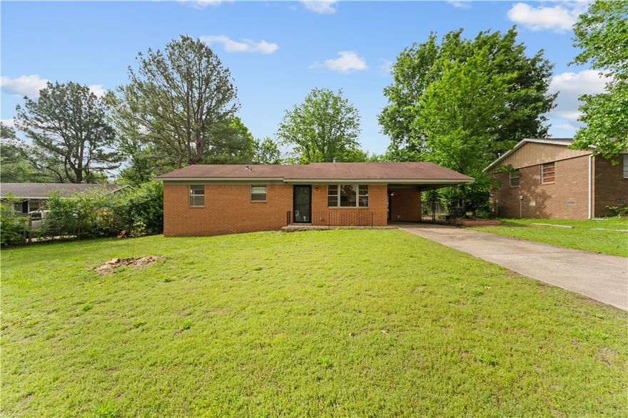 Located in the heart of Fayetteville just steps from the Scull Creek Trail and Razorback Greenway, this solid all-brick, 3-bedroom, 1.5-bathroom home represents a prime investment or sweat-equity opportunity. The structure features a functional layout with a single-car carport and dedicated attic storage, providing a sturdy foundation for cosmetic updates like new flooring and fresh paint. Its proximity to local amenities and the trail system makes it a high-demand location for both homeowners and renters. Properties with this level of potential in such a central corridor are increasingly rare—schedule your showing before this value-add opportunity is gone. Fridge, washer & dryer convey.
