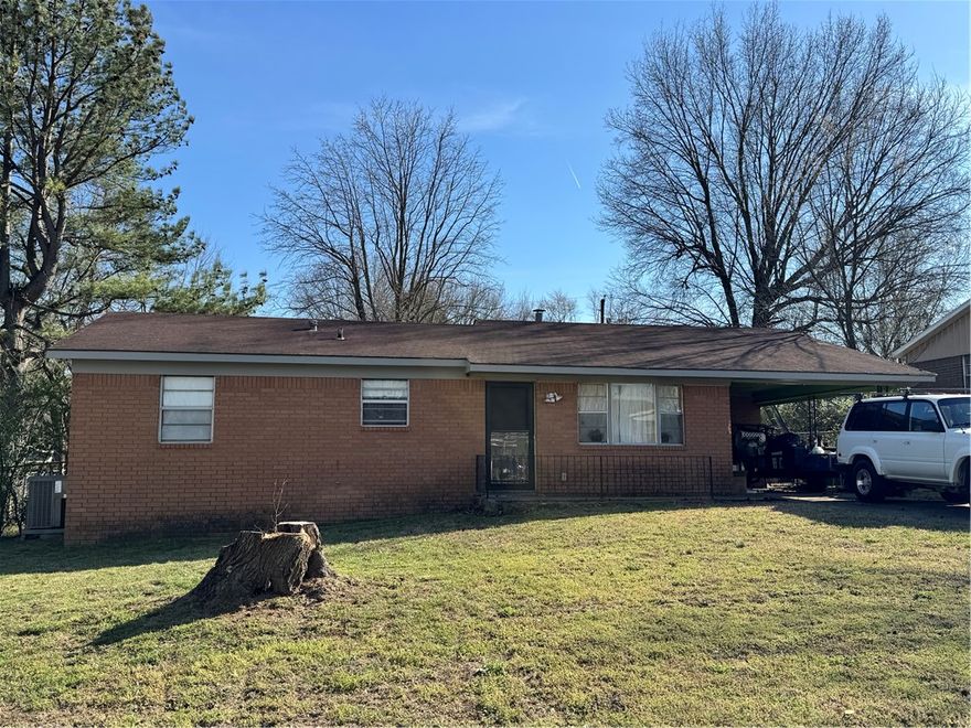 Located in the heart of Fayetteville just steps from the Scull Creek Trail and Razorback Greenway, this solid all-brick, 3-bedroom, 1.5-bathroom home represents a prime investment or sweat-equity opportunity. The structure features a functional layout with a single-car carport and dedicated attic storage, providing a sturdy foundation for cosmetic updates like new flooring and fresh paint. Its proximity to local amenities and the trail system makes it a high-demand location for both homeowners and renters. Properties with this level of potential in such a central corridor are increasingly rare—schedule your showing before this value-add opportunity is gone.