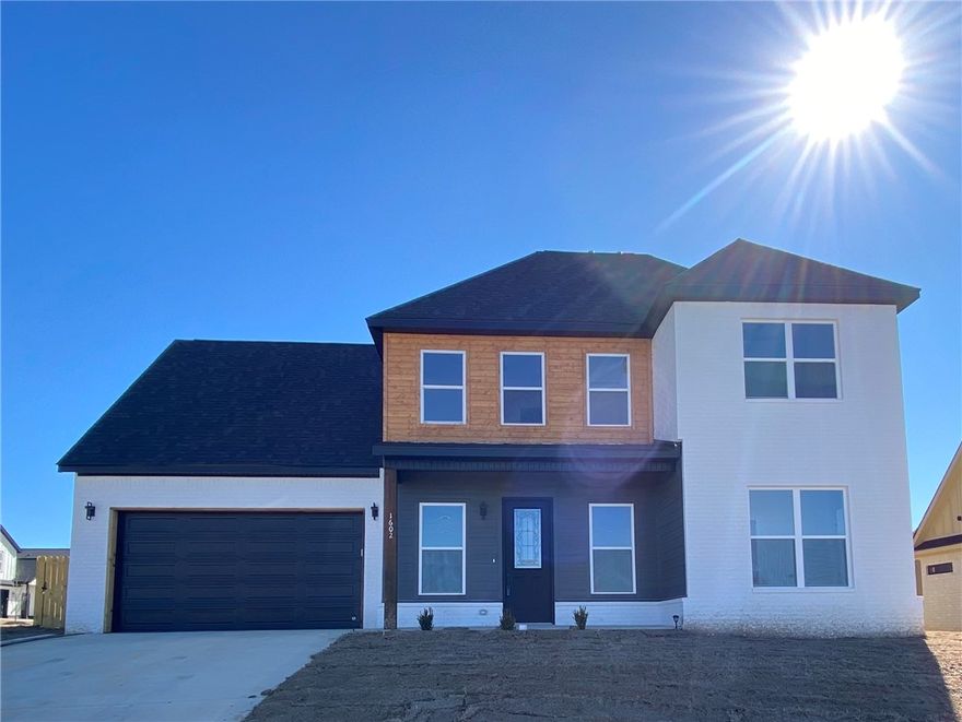 Come check out this beautifully designed new construction home in the heart of Rogers! Featuring 4 bedrooms, 2.5 bathrooms, a versatile bonus room upstairs, and plenty of storage space, this is a home you don't want to miss! The open-concept layout includes a bright, eat-in kitchen ideal for everyday living and entertaining. This home also has an energy-efficient dual-fuel heating system. Enjoy the prime location within walking distance of the Rogers Aquatic Center and just minutes from shopping, dining, entertainment, and I-49. Thoughtful design, modern finishes throughout, and unbeatable convenience make this home a must-see!