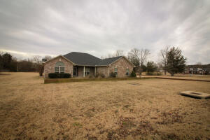 This home has it all! 4 bedrooms (split floor plan), 2 full bathrooms and a half bath for your guests. Large pantry. Beautifully updated fireplace in the living room. And a back patio that looks out to your 2.2 +/- acres. New roof in 2020. New Geothermal HVAC 2019. New Water heater 2021. All it needs is for you to put your final touches on this blank canvas to make it your own!