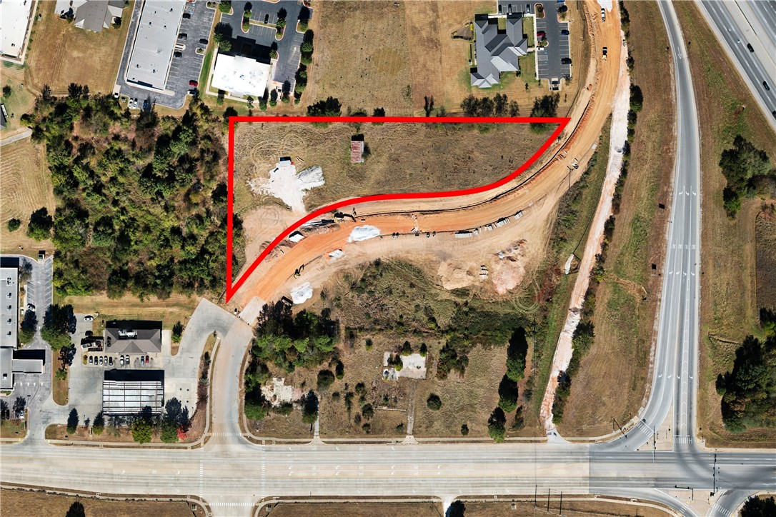 2.5 acres, more or less, with additional 3 acres available. City of Rogers is finishing an access road through the property creating additional frontage and connecting the property to Pinnacle Hills. Excellent visibility and access to I49. This is one of the best locations in Northwest Arkansas, ideal for hotels, restaurants and other commercial uses. The sellers will consider subdividing. Also listed as MLS 1289799 and MLS 1289802.
