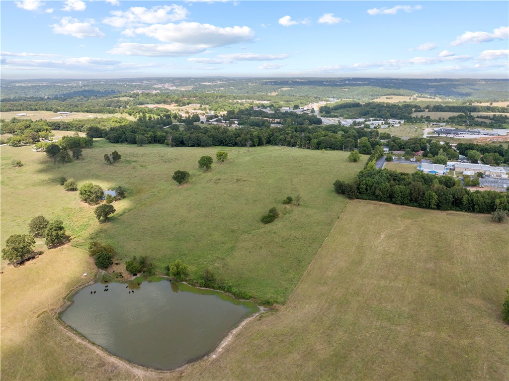 Prime development opportunity in Harrison, AR! This 18-acre tract is your chance to develop in one of Harrisonās most accessible and visible locations. Zoned R3, this property also includes architectural plans and blueprints already completed for a 30-unit apartment complexāa significant value that saves both time and cost in the planning phase! Location is a key advantage. Just 0.25 miles off US 62/65, the site provides immediate access to one of the regionās busiest highways, while sitting less than a mile from North Arkansas College. Making it an ideal fit for student housing, workforce housing, or other rental-focused projects to meet strong local demand. Currently open pasture, the land is straightforward to build on and offers flexibility for developers and investors. Whether you proceed with the existing apartment plans, explore senior living, or pursue other commercial or multifamily options, this property delivers the visibility, zoning, and market demand to support a successful project.