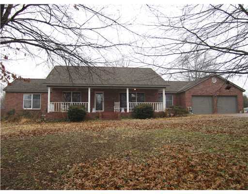 BEAUTIFUL HOME SITS ON 56.55AC JUST ABOVE CREEK GOLF COURSE. WOODED AREAS FOR PRIVACY. 2 CAR GARAGE, VAULTED CEILINGS, WOOD-BURNING FIREPLACE. 26X32 BARN.
