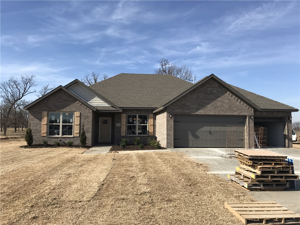 Beautiful new brick 3 BR, 2 BA, 3 car garage home with a formal dining room and a office or study with French doors. Located in Harber School District, this huge 0.40 acre lot offers a view off the covered patio of the neighboring pasture. Granite countertops, stainless appliances, open floorplan, gas cook top, crown molding, wood floors and a ton of high quality finishing touches. Don't miss it!