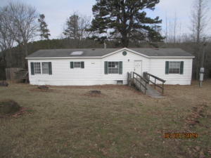 Manufactured home with deck off laundry room, fireplace, open floor plan, split bedroom plan. Home needs carpet and vinyl. Buyer's agent to pay $175.00 offer management fee at closing. All offers to be submitted by selling agent to propoffers.com.