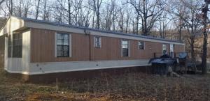 3 bedroom 1.5 bath mobile on 6 acres; pretty setting; not too far out; nice shed; owner is selling partially furnished
