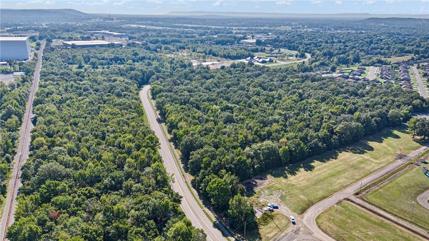 42 Acres in Russellville City Limits – Prime Development Opportunity:

This 42-acre tract offers a rare opportunity inside the Russellville city limits. Located in a designated Opportunity Zone, this property provides excellent potential for investors and developers. The site is level with water and sewer access available, making it ready for a wide range of uses.
With its flexible zoning potential, the land can be developed for commercial projects, residential neighborhoods, or mixed-use development. Its location within the city ensures access to local amenities, schools, retail, and major roadways, making it a strategic site for growth.

Key Features:
42 acres inside Russellville city limits
Located in an Opportunity Zone (investment advantages)
Level site with water and sewer accessible
Suitable for commercial, residential, or mixed-use development
This property is a blank canvas with endless potential for a visionary developer or investor.