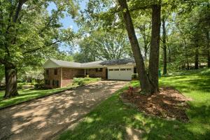 This is a beautiful home with outstanding indoor and outdoor living spacious kitchen that each open up to the overly generous back deck. The master suite, also on the main floor, includes an extra-large custom shower and jetted tub. Other custom touches in the master include a wardrobe/entertainment center and storage cabinets in the walk in. Call today to see this gorgeous home!