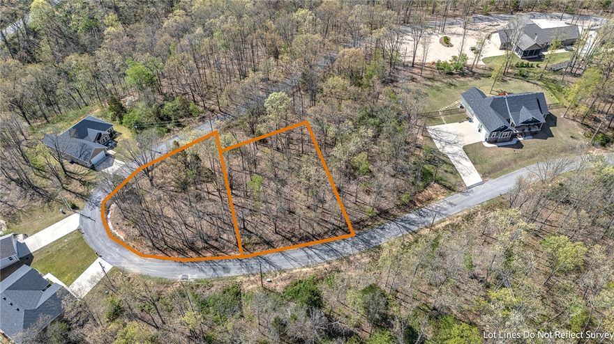Rare flat, wooded lots in the highly desirable Kinloch subdivision! Perfect for building your dream home with minimal site preparation. These two lots, sold together totaling 0.58 acres, offer a serene, nature-filled setting while still being conveniently close to Loch Lomond, scenic trails, golf, and all the Bella Vista amenities. A unique opportunity to create your ideal home in a peaceful, sought-after neighborhood.