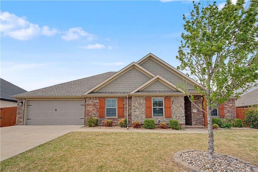 Like-new and spacious home featuring an open kitchen and living area with a gas fireplace, granite countertops, and a well-designed layout perfect for everyday living and entertaining. The large primary suite offers a spa-like bathroom with a soaking tub, walk-in shower, and oversized closet. Enjoy the covered patio overlooking the spacious backyard, ideal for relaxing or hosting guests, with the added benefit of backing up to Jim D. Rollins School of Innovation. You’re also within walking distance to Tontitown City Park, all in a rapidly growing part of Springdale.