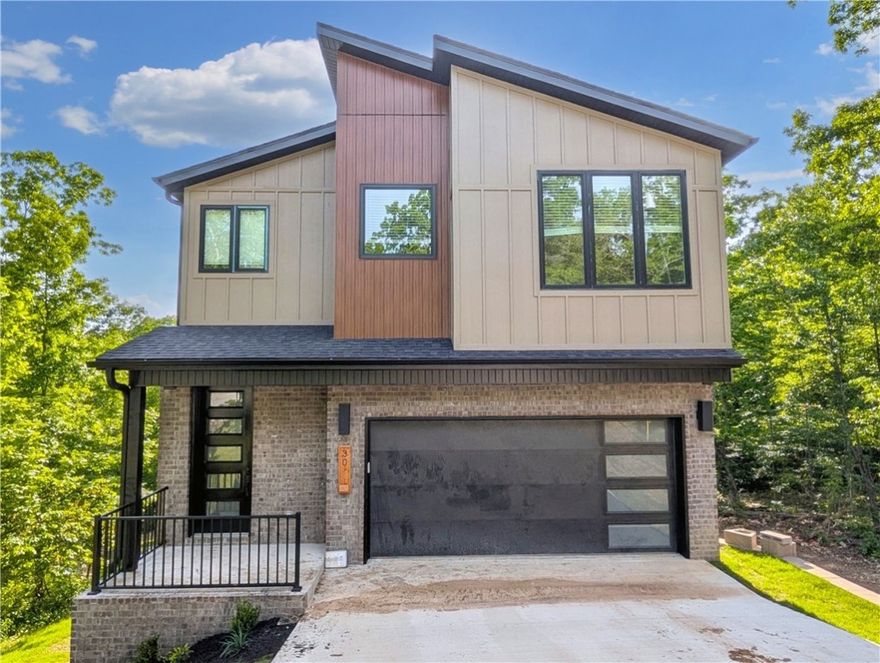 Welcome To Your Next Home! This Fantastic Build Features Modern Flair, Upgrades Galore, And A Fab Location With MTB Trail Access Right Out Your Door. Live Large - Offering 2200 SQFT Over 2 Levels. Main Level Offers Open Living, Kitchen, Dining, Half Bath. Head Up To Find The Primary Suite + 3 Secondary Beds, Full Hall Bath, Laundry. Some Offerings Include - Custom Cabinets, 3 CM Granite, Wood Plank Flooring, Wood Tread Stairs, Custom Iron Railing, Full Custom Tile Shower In Primary, Upgraded Trim Pack And So Much More! Super Solid Builder. Love The House! Love The Location! Come See!