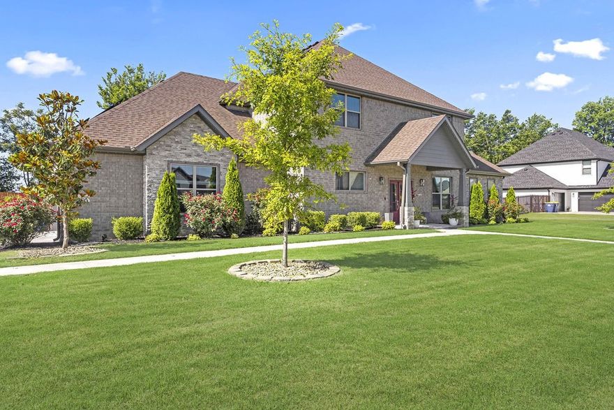 Stunning home nestled in the desirable Elmdale Lake Estates! Immaculate home boasts all amenities one could ask for with glorious natural light pouring through all spaces. Open layout flows seamlessly giving functionality to both entertaining and daily living. Gourmet kitchen is equipped w/ custom cabinetry, walk-in pantry, center island, s.s. appliances, pot-filler, built-in icemaker and reverse osmosis filtration system. Spacious bedrooms w/ bonus room provides room for all. Luxurious primary suite has his & her closet systems, dual sink vanities with makeup counter, soaking tub and sep shower. Discover your own private oasis in backyard, featuring spectacular pool, complete w/ captivating waterfall feature, vibrant LED-infused bubblers, laminars, and all controlled by an app! Short walk to the serene shores of Lake Elmdale, w/ boat ramp only moments away. Wonderful location w/ convenient access to I-49. Brush Creek Golf Course and Shaw Family Park are approx 5 minutes away. Perfect balance of luxury and comfort!