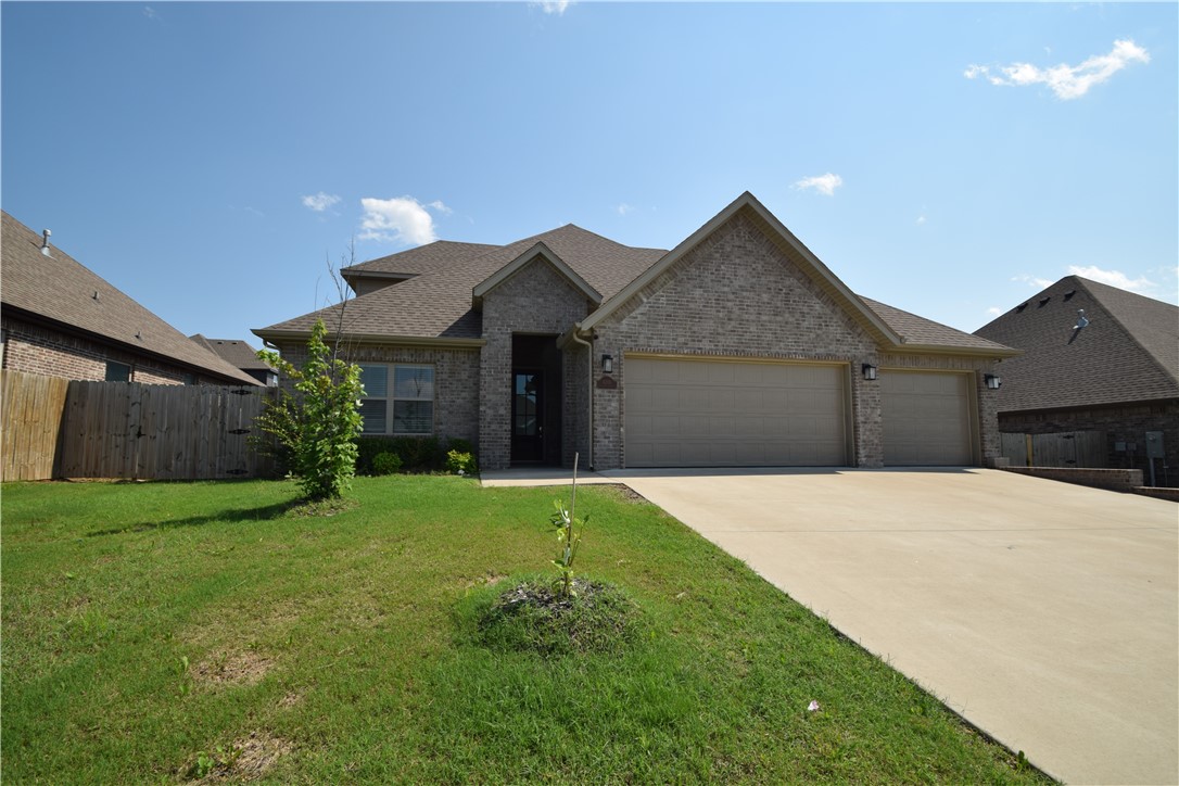 This Bentonville home offers a fantastic location with easy access to trails and community amenities. Bike trails to Osage & Creekside Parks are across the street, while the neighborhood features a pool and playground. A short drive to the Activity Center, and 15 mins to Walmart & I-49, it blends recreation and convenience. Located in the Bentonville school district, it sits on a corner lot with a privacy-fenced backyard and covered patio. Inside, 4 beds and 3 baths feature wood floors, tall beamed ceilings, and a fireplace. The open floor plan includes a kitchen with gas cooktop, granite counters, pantry, eat-at bar, and dining space. The primary suite has beamed ceilings, a walk-in closet, shower, tub, and double vanity. A 2nd bed and bath are on the main floor. Upstairs, two additional bedrooms, full bath, and a landing area perfect for a desk. Refrigerator, washer, and dryer included. Pet negotiable with owner approval. No Smoking.