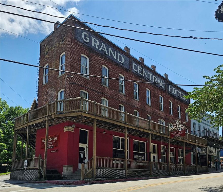 The Grand Hotel has 15 unites each with its own parking, 2 are doubles that is currently being used as overnight lodging or could be used as long term lodging. Main level has a restaurant, Tavern (not currently open) and 1 unit that can be living quarters. Lowest level is open space and can be retail, office, flea market or more lodging.
