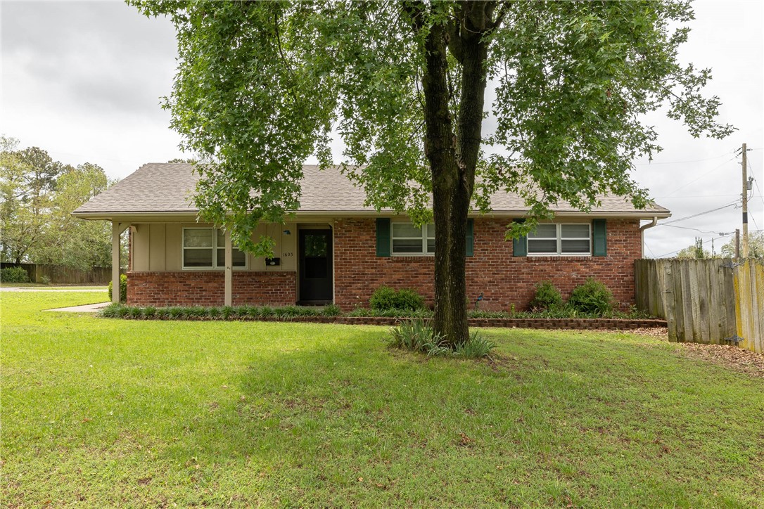 Hard to find, move in ready, ALL BRICK home situated on a LARGE corner lot in south Springdale! 1,478 heated and cooled sq ft includes 3 bedrooms, 2 full bathrooms, dining, eat in kitchen, living room, and laundry. Amenities include blinds on all of the windows, ceiling fans in all of the bedrooms, wood burning fireplace, plenty of storage, and the washer & dryer convey. HWH is 2022, HVAC is 2010 all in great working condition. New roof is going on the house soon!!